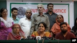 FILE - Teesta Setalvad, center, appears at a 2010 press conference in Ahmadabad, India. India has restricted activities by the US-based Ford Foundation because of its suport of an NGO founded by Setalvad.