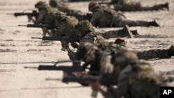 Abasirikare b'Ishirahamwe OTAN mu myimenyerezo yabo.