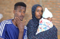 Asylum-seekers who arrived from Libya, are seen at the United Nations emergency transit center in Gashora, Rwanda, Oct. 23, 2019.