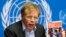 World Health Organization Assistant Director General Bruce Aylward holds a report during a news conference on Ebola at the United Nations in Geneva, Sept. 16, 2014.