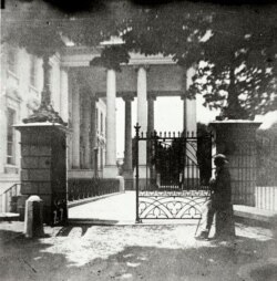 Iron gates around the White House, during the Civil War, intended to help control public access to the White House from the street. Stereograph by Montgomery Cunningham Meigs. (Library of Congress)