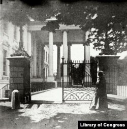 Iron gates around the White House, during the Civil War, intended to help control public access to the White House from the street. Stereograph by Montgomery Cunningham Meigs. (Library of Congress)