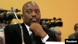 Le président Joseph Kabila ide la République Démocratique du Congo lors d'un sommet en Kampala, Ouganda