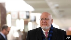 Centers for Disease Control and Prevention Director Robert Redfield arrives to brief senators during a closed all-senators briefing on the coronavirus on Capitol Hill in Washington, Jan. 24, 2020.