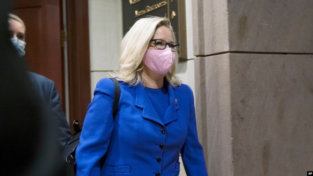 Rep. Liz Cheney, R-Wyo., arrives as House GOP members meet to decide whether she should be removed from her leadership role as chair of the Republican Conference.