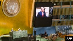 This UN handout photo shows US President Donald Trump(on screen), as he addresses the general debate of the seventy-fifth session of the United Nations General Assembly, on September 22, 2020 at the UN in New York.