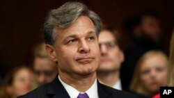 FBI Director nominee Christopher Wray prepares to testify on Capitol Hill in Washington, Wednesday, July 12, 2017, at his confirmation hearing before the Senate Judiciary Committee. 