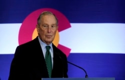 FILE - Democratic U.S. presidential contender Michael Bloomberg speaks to gun control advocates and victims of gun violence in Aurora, Colorado, Dec. 5, 2019.