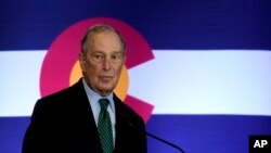 FILE - Democratic U.S. presidential contender Michael Bloomberg speaks to gun control advocates and victims of gun violence in Aurora, Colorado, Dec. 5, 2019. 