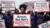 Activists hold placards during a protest against alleged rape at Moi Girls High School, a prestigious government boarding school, in Nairobi, Kenya, June 11, 2018. Accusations were also made at Maasai Girls High School in Kenya's Narok County.