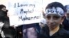 Muslim children hold up a placard before taking part in a protest march against a U.S-made film and cartoons published by a French magazine that denigrate Islam's Prophet Mohammad, in Freiburg September 21, 2012. REUTERS/Vincent Kessler (GERMANY - Ta