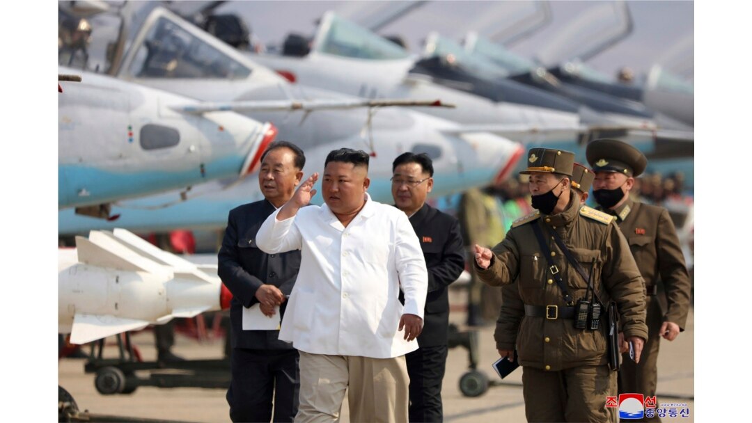 FILE - In this undated file photo provided by the North Korean government on April 12, 2020, North Korean leader Kim Jong Un inspects an air defense unit in western area, North Korea.
