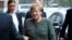 Angela Merkel, leader of the Christian Democratic Union (CDU), arrives at the German Parliamentary Society offices before the start of exploratory talks about forming a new coalition government in Berlin, Nov. 10, 2017. 
