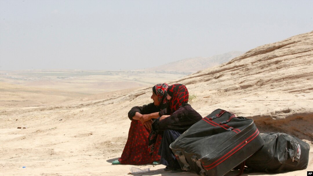 Người Syria vượt biên giới vào Iraq để tị nạn, 20/8/13