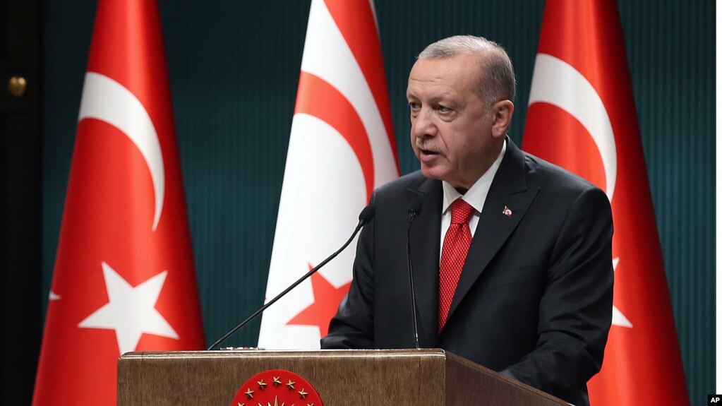 Turkey's President Recep Tayyip Erdogan speaks during a news conference, in Ankara, Turkey, Oct. 26, 2020. 