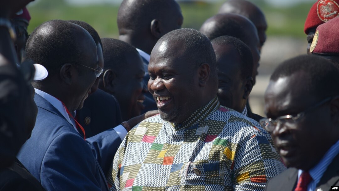 FILE - South Sudan opposition movement leader Riek Machar (C) meets with supporters at Juba international airport, in Juba, South Sudan, April 26, 2016.
