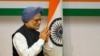 FILE - Then-Indian Prime Minister Manmohan Singh gestures as he arrives to address a news conference in New Delhi on Jan. 3, 2014. Singh died at the age of 92 on Dec. 26, 2024.