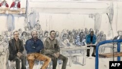 FILE - This court sketch on January 9, 2024 at the Assize court in Bobigny, near Paris, shows the three police officers who appear, LtoR, Marc-Antoine Castelain, 34, Jeremie Dulin, 42, and Tony Hochart, 31, over the violent arrest in 2017 of French Theo Luhaka (3rdR), 28.