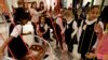 FILE - Girls from a city preparatory school play with an interactive exhibit at the National Museum of Mathematics in New York.