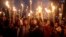 Activists shout slogans as they participate in a rally in Dhaka, Dec. 12, 2013. 