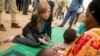 US Ambassador to the United Nations Samantha Power meets with a woman and her children who fled to Mokolo, Cameroon, April 18, 2016, to escape Boko Haram.