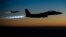 FILE - A pair of U.S. Air Force F-15E Strike Eagles fly over northern Iraq after conducting airstrikes in Syria, in this U.S. Air Force handout photo.
