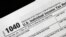 FILE - A 1040 tax form for U.S. individual filers is displayed in New York in a Jan. 10, 2017, photo.