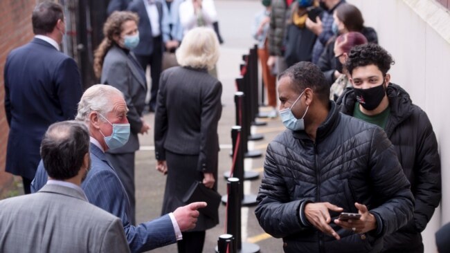 Britain's Prince Charles visits a pop-up COVID-19 vaccination center at the Finsbury Park Mosque, amid the coronavirus disease (COVID-19) pandemic, in London, March 16, 2021.