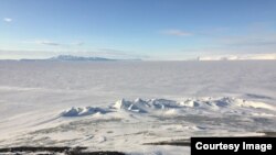 FILE - The pressure ridges (ice formations) below Observation Hill, a 754-foot hill adjacent to McMurdo Station in Antarctica. (Photo by Refael Klein)