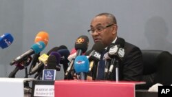 FILE - New president of the African soccer confederation Ahmad of Madagascar, speaks at a press conference in Marrakesh, Morocco, Tuesday, March 28, 2017. 