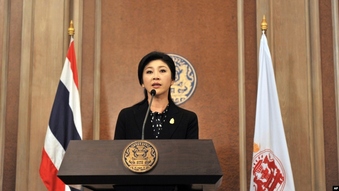 Thai Prime Minister Yingluck Shinawatra speaks at a news conference after a cabinet meeting at an Air Force base in Bangkok, Thailand, Dec. 25, 2013.
