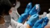 Japan Begins Workplace Vaccination Program 
