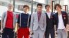 Members of British-Irish band One Direction pose after performing on NBC's "Today" show in New York March 12, 2012.