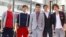 Members of British-Irish band One Direction pose after performing on NBC's "Today" show in New York March 12, 2012.