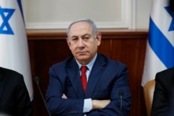 Israeli Prime Minister Benjamin Netanyahu chairs a weekly cabinet meeting in Jerusalem, Jan. 5, 2020. (Ronen Zvulun/Pool via AP)