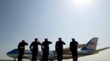 President Barack Obama is celebrating Earth Day with a visit to the Everglades to talk about how global warming threatens the U.S. economy. In this photo, military personnel salute as Air Force One departs with the president aboard from Andrews Air Force Base, Maryland on its way to the Everglades, April 22, 2015.