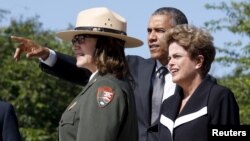 U.S. President Barack Obama and Brazil President Dilma Rousseff tour the Martin Luther King Jr. Memorial with a National Park ranger in Washington, June 29, 2015.