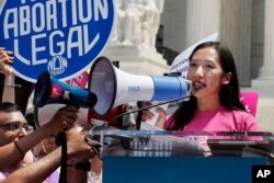 FILE - Planned Parenthood President Leana Wen speaks during a protest against abortion bans outside the Supreme Court in Washington, May 21, 2019. Wen, who became the president in November 2018, was forced out of her job July 16, 2019.