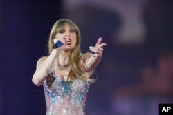FILE - Taylor Swift performs as part of the "Eras Tour" at the Tokyo Dome on Feb. 7, 2024, in Tokyo.