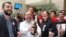 FILE - Members of the activist group Motion of Integration and Gay Liberation celebrate the congressional passage of a bill recognizing civil unions in Valparaiso, Chile, Jan. 28, 2015. Registration of such unions begins this week.