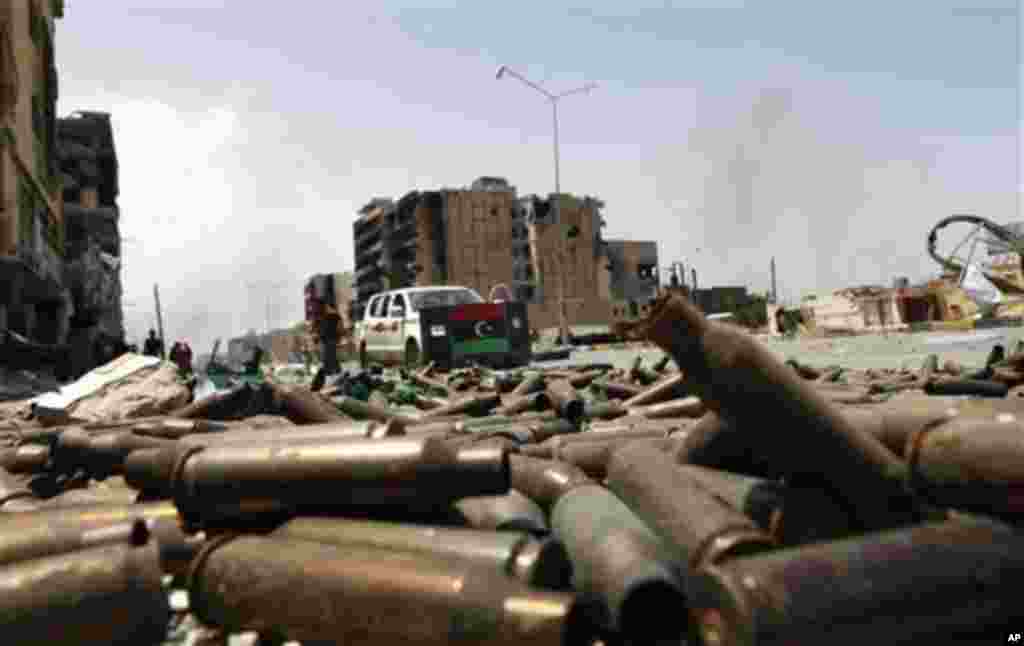 Bullet casings litter a street in Misrata, April 23, 2011. (AP image)