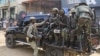 Members of the M23 rebel group gather on their truck after recovering guns during a community exercise aimed at strengthening local solidarity, following their takeover of Bukavu, eastern Democratic Republic of Congo, Feb. 20, 2025. 