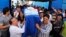 Relatives carry a coffin with the remains of Rodrigo Quintana, a member of the Authentic Radical Liberal Party, who was killed in an incident at party's headquarters away from congress at the party's headquarters on Friday, in Asuncion, Paraguay, April 1,