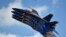 The U.S. Navy flight demonstration squadron, the Blue Angels, perform during the Vectren Dayton Air Show in Dayton, Ohio. 