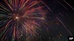 Firecrackers and smoke fill the city skyline as a part of Diwali celebrations at Shivaji Park in Mumbai, India, Oct. 30, 2024.