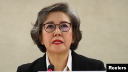 FILE - Special Rapporteur on the situation of human rights in Myanmar, Yanghee Lee gives her report to the Human Rights Council at the United Nations in Geneva, Switzerland, March 11, 2019.