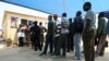 FILE - Zimbabweans deported from Botswana wait at the International Organization for Migration center in Zimbabwe, Sept. 12, 2009. This week, hundreds of Zimbabwean refugees in Botswana were told they must return to their home country. 