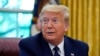 President Donald Trump listens as he receives a briefing on the 2020 hurricane season in the Oval Office of the White House, Thursday, May 28, 2020, in Washington. (AP Photo/Evan Vucci)