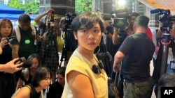 FILE - Selina Cheng, chair of the Hong Kong Journalists Association, speaks to media in Hong Kong on July 17, 2024. An HKJA survey released this week shows a dim view among journalists and the public of the state of press freedom in Hong Kong.