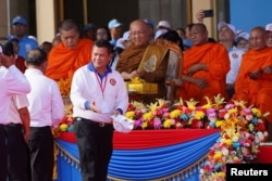 General Hun Manet, son of Cambodia’s Prime Minister Hun Sen, attends an election campaign for the national election in Phnom Penh on July 1, 2023. (Cindy Liu/Reuters)